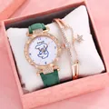 Close-up of rose gold watch with star charm bracelet set in a pink gift box - Green Watch + Bracelet + Gift Box