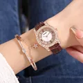Dettaglio del set orologio in oro rosa con strass e bracciale con stella al polso - Orologio E Bracciale / caffè
