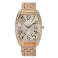 Montre tonneau luxe en or rose avec pavage de diamants et chiffres arabes artistiques - Or rose