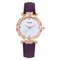 Détail d'une montre or rose avec lunette en cristal, cadran papillon et bracelet violet - Montre Violette Uniquement