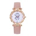 Detailed close-up of pink leather watch strap with rose gold rhinestone case and dog dial - Pink Watch Only