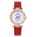 Close-up of a women's quartz watch with a rhinestone bezel and cute cartoon dog dial - Red Watch Only