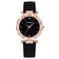 Detailed macro of rose gold bezel with rhinestones and black starry sky dial design - Black