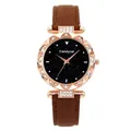 Detailed view of women's starry sky watch with rose gold rhinestone case and brown leather strap - Brown