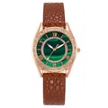 Detail of green malachite dial with rose gold Roman numerals and pebble leather strap - Brown