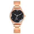 Close-up of rose gold watch dial featuring a cute rabbit pattern and crystal bezel - Black