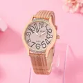 Montre élégante or rose pour femme avec lunette en strass et bracelet tressé brun - Nu