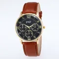Detail of IFKF business quartz watch with gold case, brown leather strap and black dial - Brown Strap Black Dial