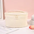 Quilted cream vanity bag with plush grid texture and top handle for women - Beige Apricot