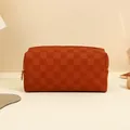 Orange-red checkerboard textured PU makeup bag with gold zipper for travel storage - Checkerboard Style / Brown