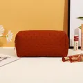 Minimalist woven PU leather cosmetic bag in clay red brown finish with gold zipper - Woven Pattern / Brown