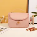 Pink PU makeup travel bag with diamond weave texture and gold double zipper hardware - Woven Texture / Rose Pink