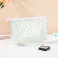 Transparente Kosmetiktasche mit mintgrünen Blumenmustern und Silberreißverschluss - Cremegrün