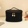 Large black checkered cosmetic bag with gold moon pendant and top handle for travel - Oval Style (Midnight Black)
