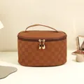 Brown checkered embossed makeup bag with golden double zipper and handle for travel - Oval Style (Mocha Brown)