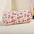 Chic quilted makeup bag with floral patterns and a ring zipper closure in cream white - Red Floral