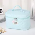 Light blue quilted cosmetic bag with handle and cute pink bear charm decoration - Blue