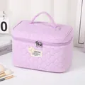 Lavender quilted makeup bag with handle and cute bear patch for travel storage - Purple