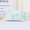 Light blue heart quilted cosmetic bag with marble print and top zipper closure - 19.3cm x 9cm x 10.2cm / Light Green