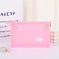 Pink mesh makeup pouch with cute bear patch for portable cosmetic storage in travel - Sakura Pink