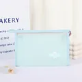 Light blue transparent mesh cosmetic bag with cute bear patch and zipper handle - Aqua
