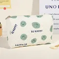 Gesteppte Kosmetiktasche in Creme mit grünen Smileys und Be Happy Aufdruck für Reisen - Mittel / Grünes/smiley-gesicht