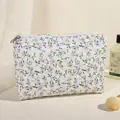 Quilted floral makeup bag with purple flower pattern and spacious storage compartment - Purple Floral