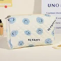 Quilted cream cosmetic bag with blue smiley faces and Be Happy print detail - Medium / Blue/Smiley
