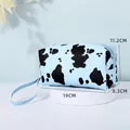 Light blue cow print makeup bag with zipper and handle, 19cm travel toiletry pouch - Pillow Style