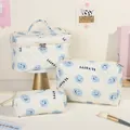 Lot de 3 trousses à maquillage matelassées crème avec motif smiley bleu et texte - Visage Bleu/souriant