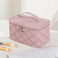 Pink embossed floral PU leather makeup bag with dual zippers and handle detail - Lilac (X-158-3)