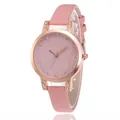 Montre quartz rose pour femme avec cadran scintillant or rose et lunette en strass - Rose