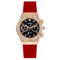 Detail der roségoldenen Lünette mit Kristallbesatz und leuchtend rotem Silikonarmband - Rot