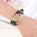 Detail of vintage square quartz watch with colorful numerals and green studded strap - Green