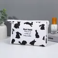 Portable cosmetic bag with black rabbit print and sleek zipper in white finish - Business Storage Bag (X-152) / Black and White Print