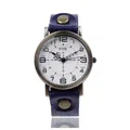 Macro detail of retro quartz watch with navy leather strap and bronze metal case - Navy Blue