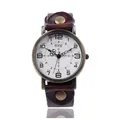 Macro detail of retro bronze watch case with brown leather rivet strap and white dial - Dark Brown