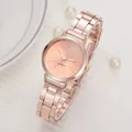 Elegant rose gold women's quartz watch with slim metal strap and minimalist dial - Rose Gold