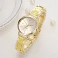 Elegant gold quartz watch for women featuring a slim metal strap and minimalist dial - Gold