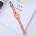 Pink quartz watch with rose gold case and heart-shaped rhinestones on the dial - Pink