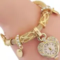 Orologio donna a forma di cuore dorato con ghiera di strass e cinturino a maglia mesh - Oro