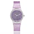 Close-up of purple glitter silicone watch with transparent case and white Arabic numerals - Purple