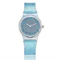 Close-up of sky blue glitter watch with Arabic numerals and clear plastic case - Sky Blue