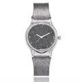 Detail of silver glitter silicone strap and clear resin case on starry sky quartz watch - Black
