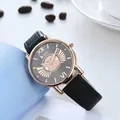 Women's quartz watch with black leather strap and golden bear motif on the dial - Black
