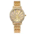 Elegant gold quartz watch for women with rhinestone bezel and sparkling star pattern dial - Gold