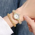 Elegante set orologio al quarzo dorato con maglie di strass a cuore e bracciale - Orologio E Bracciale / Oro