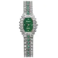 Detailed close-up of a silver-tone luxury quartz watch with green dial and crystals - Watch Only / Silver Strap Green Dial Watch