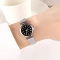 Close-up of elegant silver mesh strap watch with a minimalist black Roman numeral dial - Silver Strap Black Dial Roman Numerals
