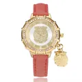 Women's gold owl watch with red glitter strap and crystal bezel on white background - Red